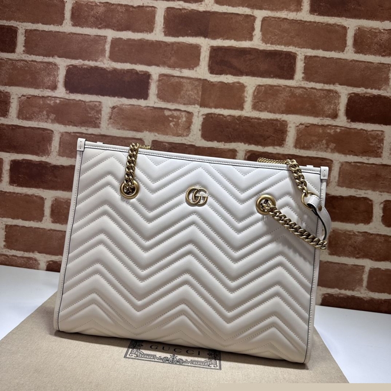 G*u*i top handle bags